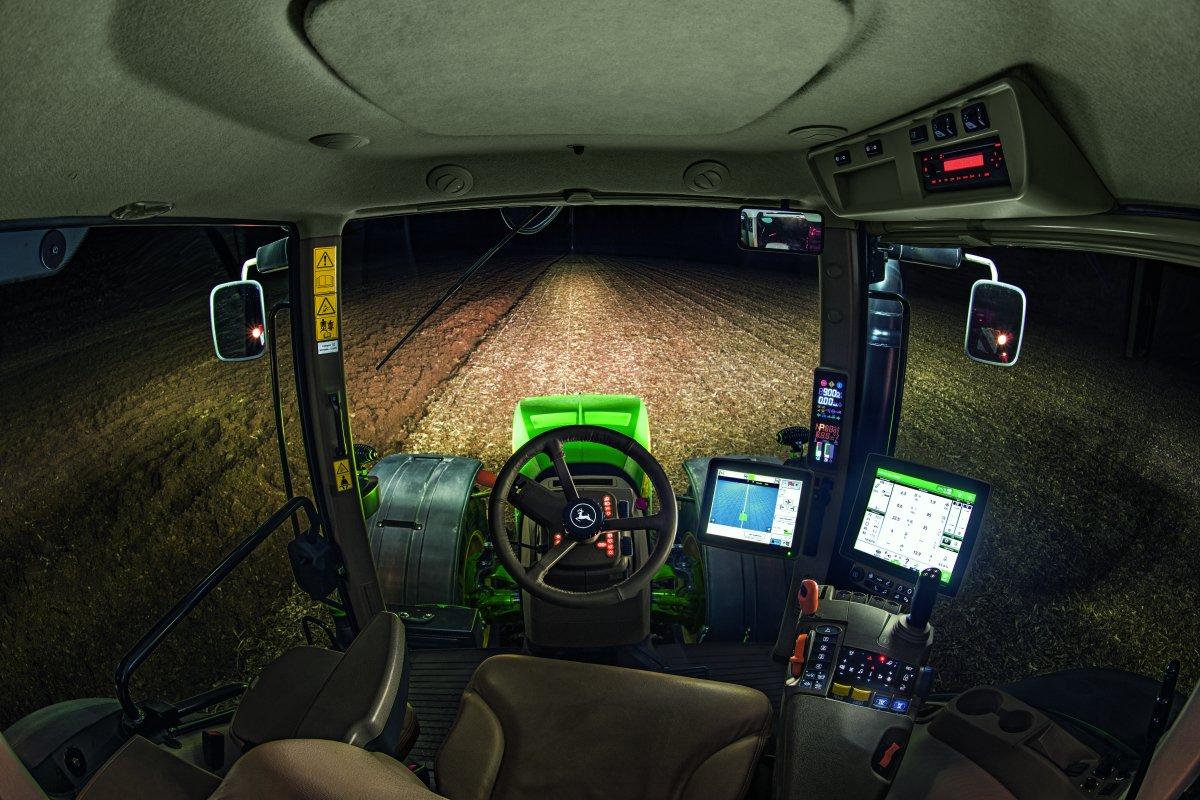Modern tractor cab working at night